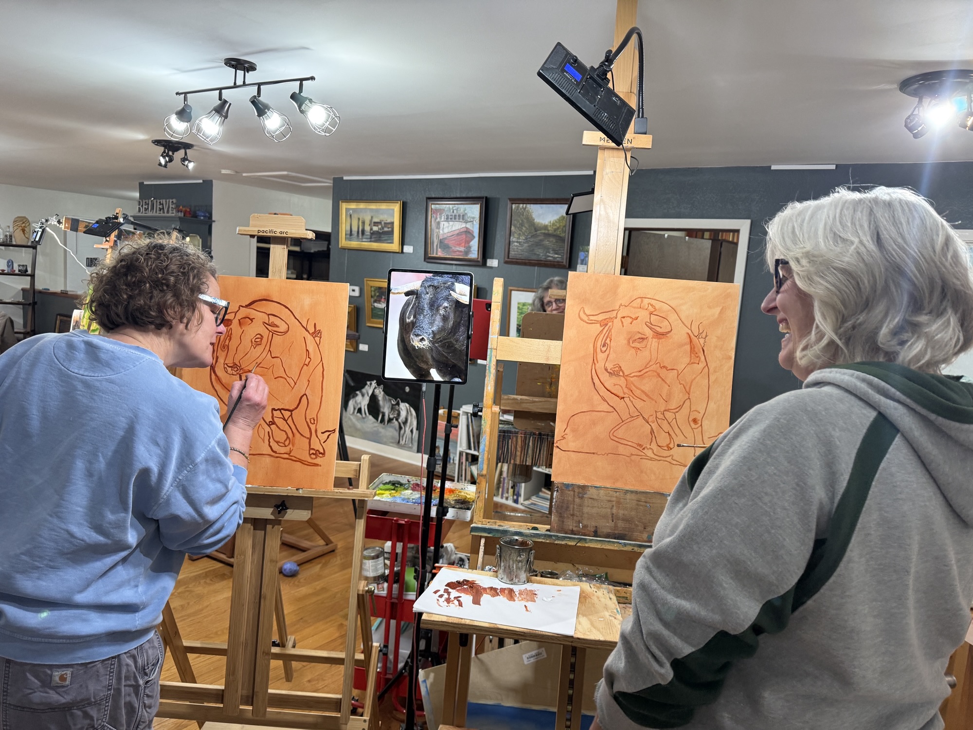 Oil painting a bull day one at Village Art